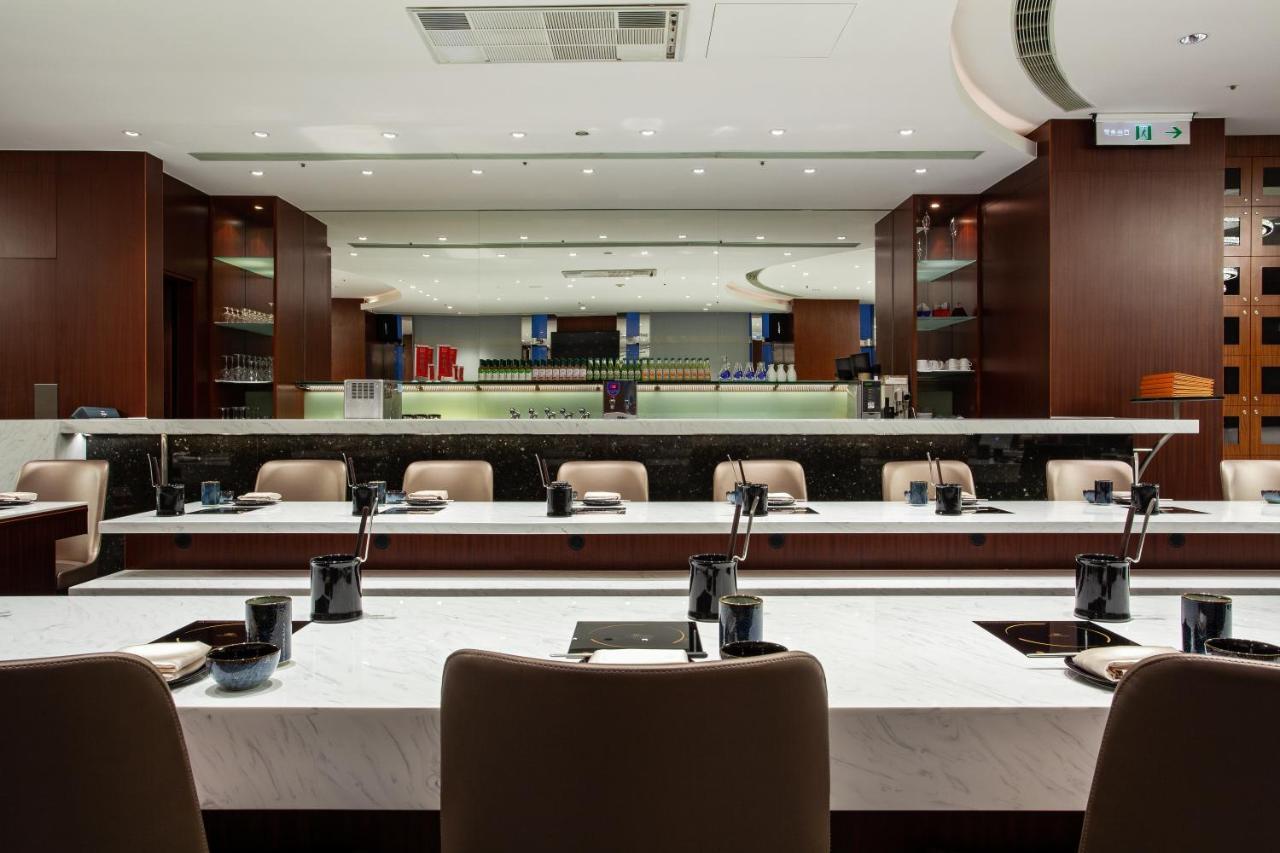 Ambassador Hotel Hsinchu Bagian luar foto The Hong Kong Stock Exchange