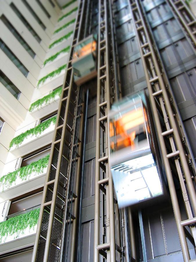 Ambassador Hotel Hsinchu Bagian luar foto The staircase in the atrium